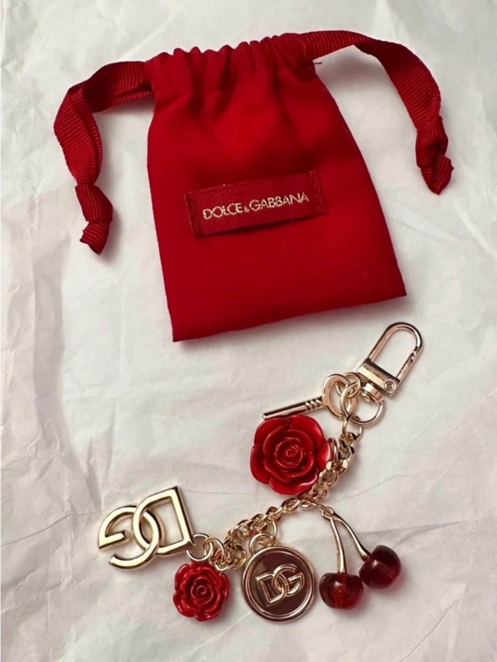 Designer gold-tone keychain With red rose & cherry charms